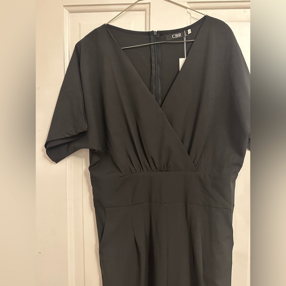 Black short sleeve jumpsuit with ankle ties
